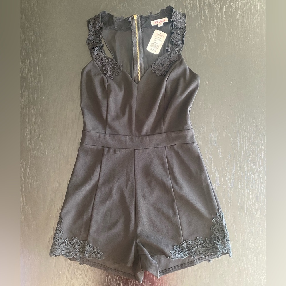 AGACI NWT black romper size Medium